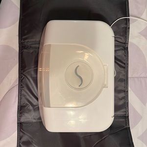 Wipe warmer and changing pad.